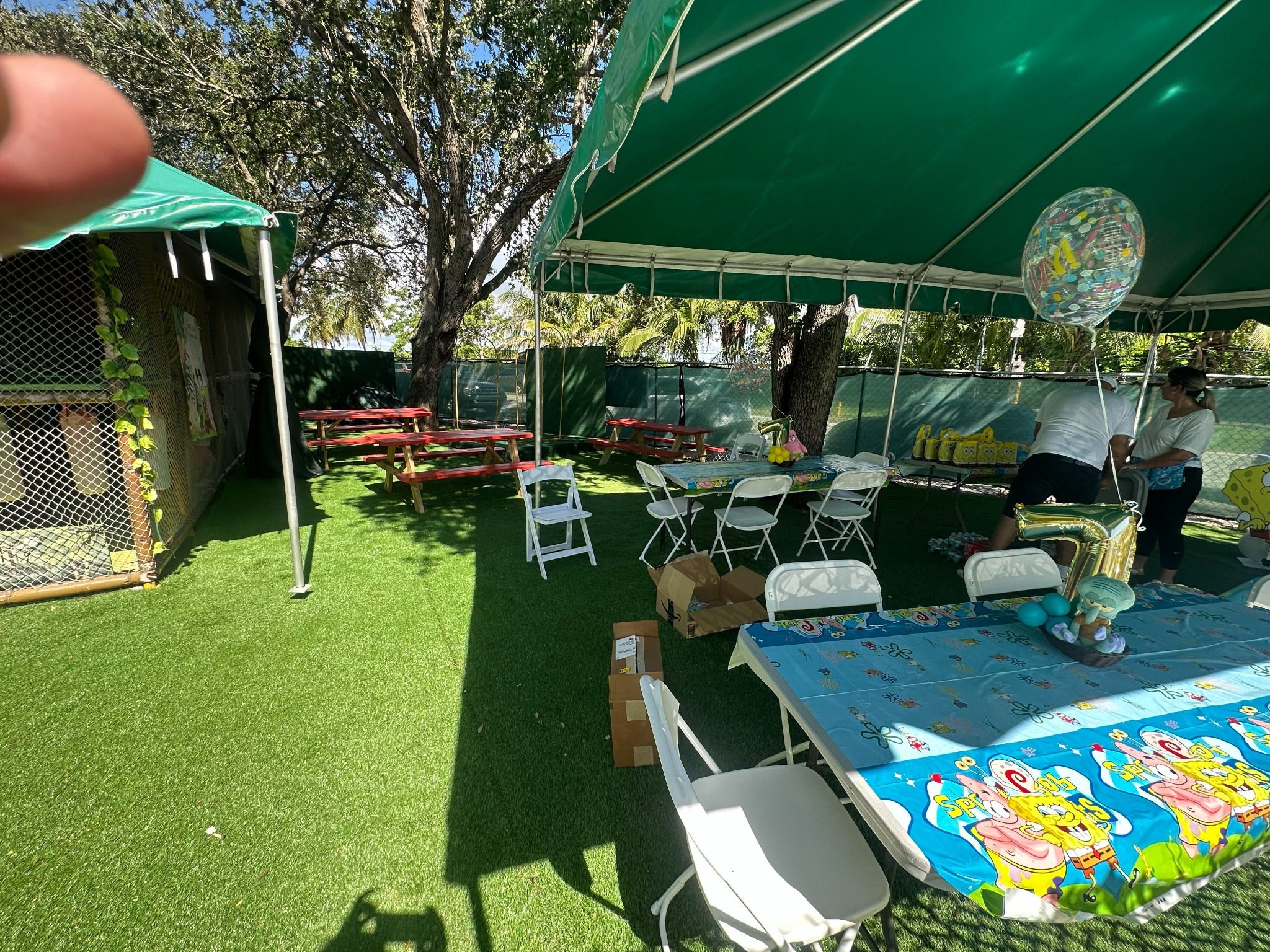 Private birthday party area with covered seating at Fun Games