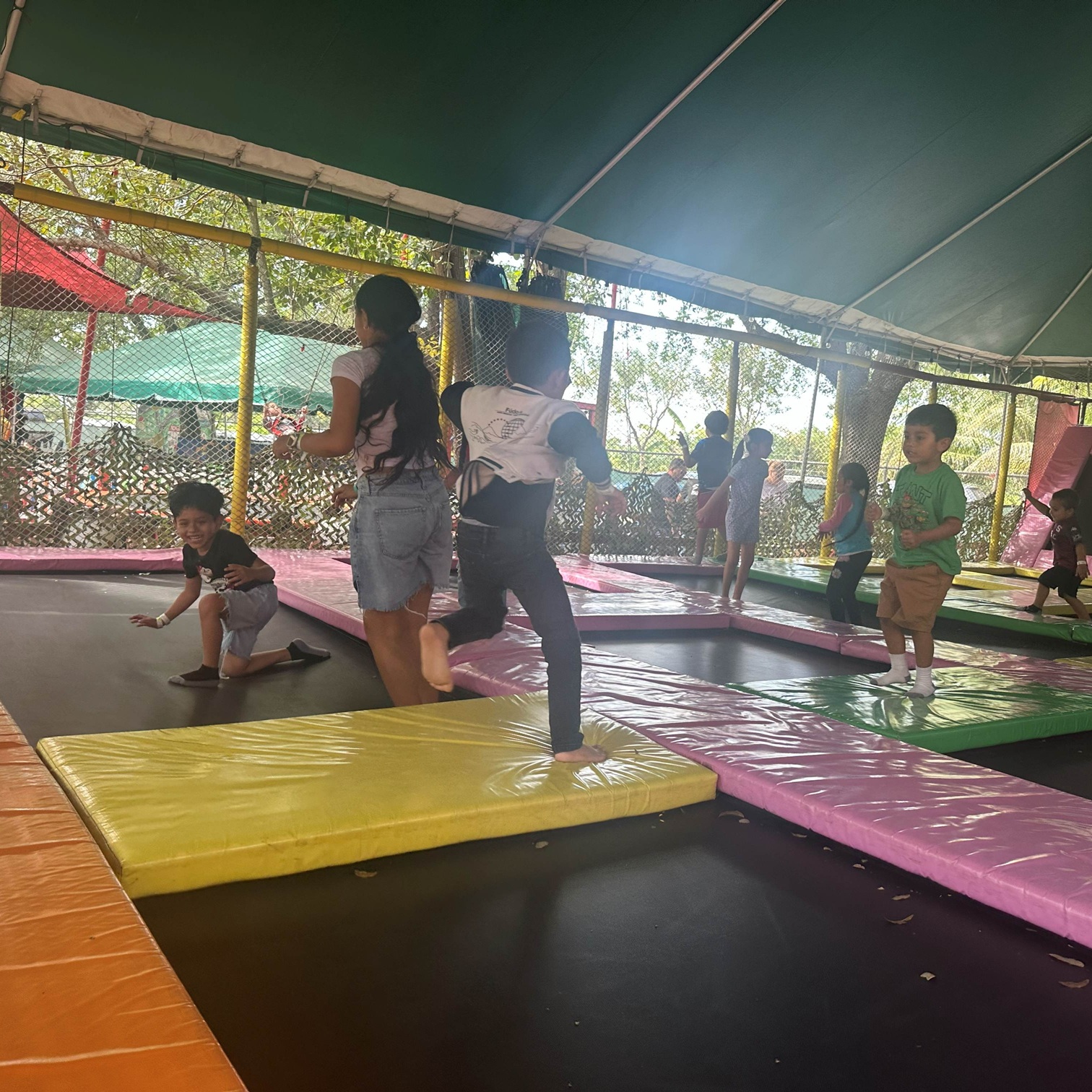 Children enjoying the trampoline area at Fun Games Adventure Park